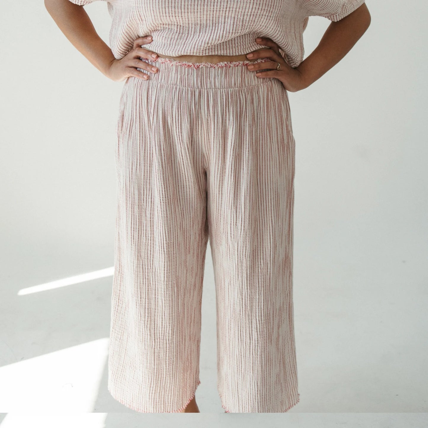 Striped crinkle palazzo pants red